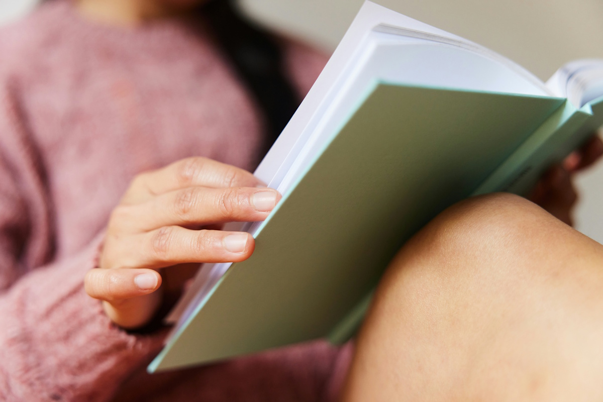 Woman looking in a book