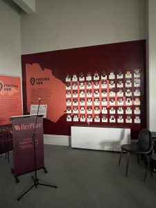 Photograph of a wall with a painted map of Victoria, featuring pamphlets pinned to the map. 