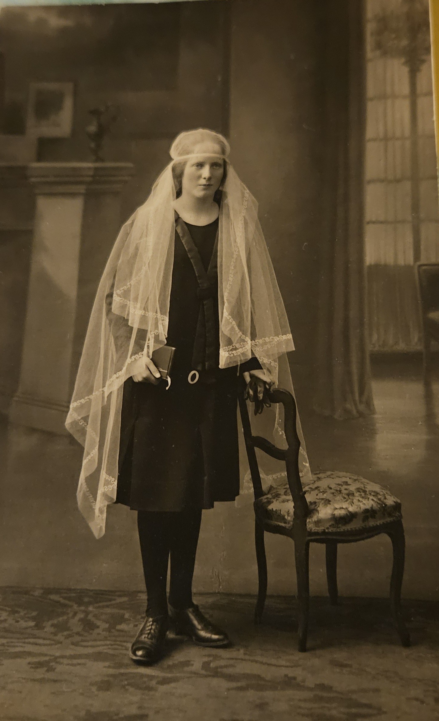 Hedwig Benz at age 16, photographed in her communion attire in Switzerland.